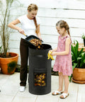 Woman and child using a 34 Gallon Outdoor Compost Bin With Handles And Observation Windows, Thickened Breathable Foldable Design