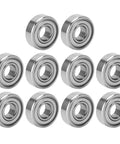 Premium 10-Pack Thonlai Miniature Stainless Steel Bearings For Automotive And Home Gear, High Speed 15X6X5mm arranged in a row.