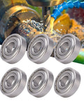 Premium Ycauty S6304z Stainless Steel Mini Bearings 10 Pack for Hot Rods and Heavy Machinery, visible in a machining setting.