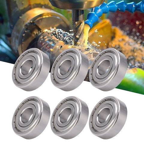 Premium Ycauty S6304z Stainless Steel Mini Bearings 10 Pack for Hot Rods and Heavy Machinery, visible in a machining setting.