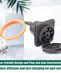 Top Tier Electric Golf Cart Charger Receptacle Head Replacement For Evolution Powersports Advanced Ev And Aeric Provides Dead Simple Plug And Play Upgrades With Hella Fast 3 Pin 30 Amp 110V 220V Port close-up of 3 pin black charging socket with orange wire.