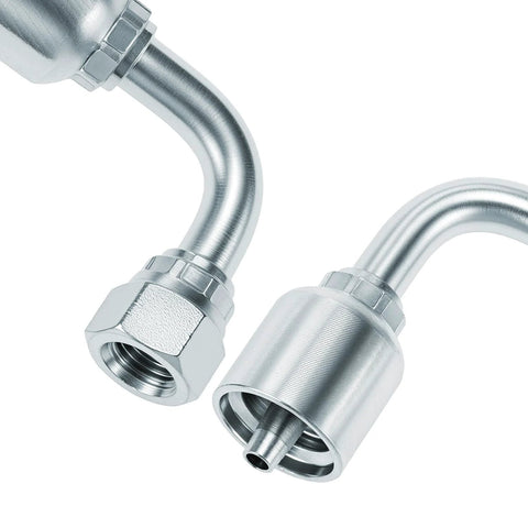 Close-up view of two 1/4-inch JIC 37° hydraulic fittings with 90-degree elbows in metal
