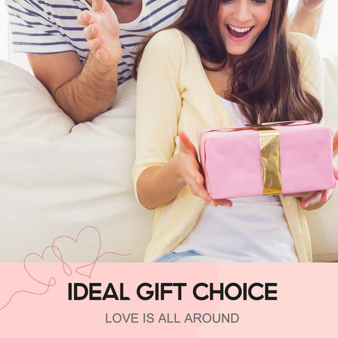 Happy woman receiving pink gift box with golden ribbon, close-up