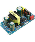 Heavy Duty Industrial AC DC Power Converter Converts 110 220 V Down To Smooth 12 V At 72 Watt Peak with capacitors and circuit.