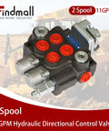Front view of a 2-spool hydraulic directional control valve, black cast body with red port plugs and metal fittings.