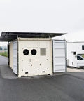 Built Tough Off Grid Modular Cold Room And Walk In Freezer System Featuring Solar Powered Blast Chiller For Commercial Food Storage With Quick Install and exterior view showing solar panels and large doors.