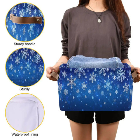 Dang Cool Canvas Storage Basket With Sparkly Winter Snowflake Pattern Heavy Duty Foldable Bin Water Repellent Interior And Tough Leather Handles Makes Home Office Projects A Real Snap, held by a person with jeans.
