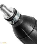 Close-up of primer bulb from Three Eighth Inch Nylon Braided Marine Fuel Line Assembly With Primer Bulb And Stainless Clamps Six Foot Universal Fuel Line Kit For Outboard Motors RVs Tractors And More Ethanol Compatible Low Permeation Hose