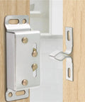 Slick Double Roller Cabinet Catch Set For Smooth Door Closure with stainless steel housing and copper tone shell on wooden door