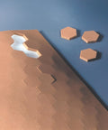 3M Scotch SJ5201 Series Bumpons Self-Adhesive Bumpers showing light brown hexagonal pieces on blue background