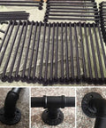 Rock Solid Adjustable Stair Handrail Featuring Smooth Round Pipe Grip And Heavy Duty Galvanized Steel Construction For Hella Secure Wall Mounted Support Indoors Or Outdoors - black pipes and mounting brackets.