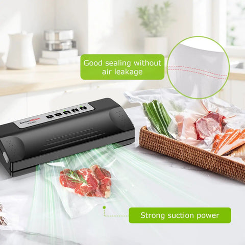 Powerful Vacuum Sealer For Food With Automatic Mode sealing steak and vegetables, black silver compact design on kitchen counter.