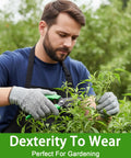 Man wearing cut resistant gloves pruning plants with shears in a garden, showcasing gloves' non-slip grip and comfort.
