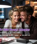Couple smiling with 24V 60W Power Supply Adapter, 5.5 x 2.1mm DC Plug on table, UL Listed AC to DC converter for LED strip lights.