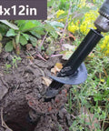 Auger drill bit for planting, 4x12 in, black metal with spiral cutter, attached to drill in garden soil