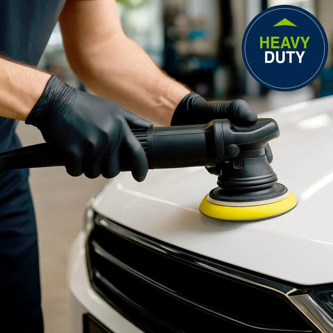 Person using Built Tough Black Nitrile Exam Gloves 5.1 Mil Heavy Duty Powder Free Disposable for auto detailing work.