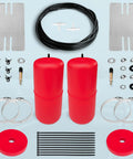 Top-down view of FLOVENTIS air suspension kit: two red air springs with hoses and mounting hardware for GM SUVs