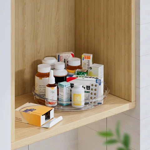 4 Pack Lazy Susan Organizer Set with 12 Inch High Edge Turntable holding medicine bottles in a wooden kitchen cabinet