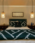 Plug And Play Pendant Light Hand Braided Natural Hemp Rope Hanging Lamp Industrial Farmhouse Style With Toggle Switch For Dining Room Kitchen above a stylish bed with green and white bedding.