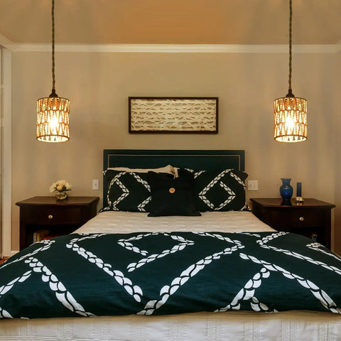 Plug And Play Pendant Light Hand Braided Natural Hemp Rope Hanging Lamp Industrial Farmhouse Style With Toggle Switch For Dining Room Kitchen above a stylish bed with green and white bedding.