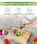 Person wearing 500 Pack Clear Disposable Gloves for Cleaning and Food Prep, slicing green pepper on cutting board.