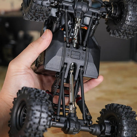 Heavy Duty Stainless Steel Drive Shafts For Redcat Ascent 18 Apex installed on RC rock crawler's undercarriage.