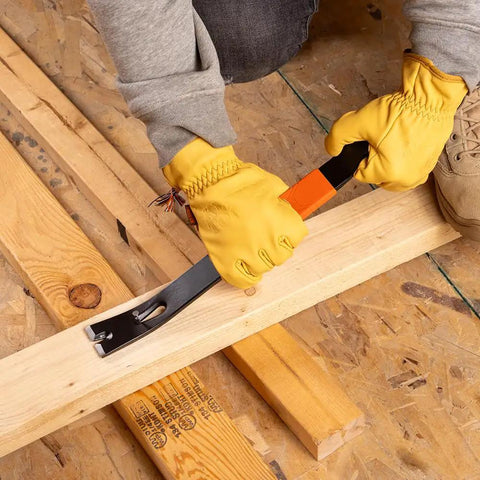 Person using Heavy Duty 15 Inch Pry Bar Crowbar With Curved Claw And Beefy Nail Slots Forged Carbon Steel Construction for lifting wood