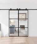 48 By 84 Inch Metal And Glass Sliding Double Barn Door With Hardware Kit Soft Close Included Rust Resistant Powder Coated Frame For Easy Assembly Ready To Install shown installed in a living room.