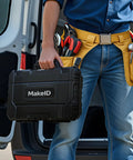 Top Tier Portable Bluetooth Label Maker And Wireless Printer Hella Tough For Serious Wire Cable Tagging Job Site Grind Heat Shrink Tubing All Weather Tape Bundle Comes With Hard Case held by a tradesman.
