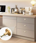 Four Pack Seabird Fence Vintage Gold Cabinet Knobs With Round Pull Design For Drawers Walls And Dressers, Scratch Resistant Gold Finish shown on drawer