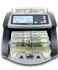 Ultra Fast Cash Counter With UV, MG And IR Counterfeit Detection, Add And Batch Modes, Large LCD Display, Counts Up To 1,300 Bills Per Minute, Pro Grade For Banks, Shops And Cash Heavy Workflows displaying counted bills