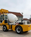 Rock Solid Mobile Self Loading Concrete Mixer Truck With Compact Frame And Pro Mixing Tech Built For Tight Job Sites To Crush Every Wet Batch And Keep Your Crew Working Smoothly, side view showing its thickened steel drum.