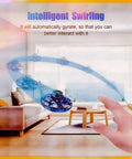 Hand Operated Mini Drone Orb With LED Lights UFO Magic Flying Spinner hovering indoors near a hand in a modern room setting