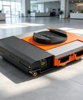 Badass Heavy Duty Electric Mover Transfer Cart With Remote Control Steering Smooth Rotating Turntable Load Platform close up view on smooth floor.