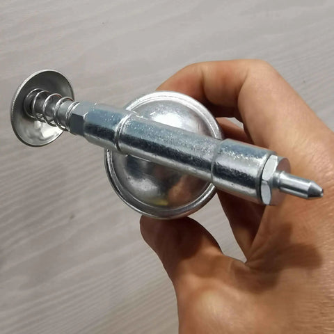 Hand holding Compact Pneumatic Grease Gun With Short Nozzle For Precise Lubrication, Handy One Hand Operated Mini Tool, All Metal Construction