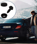 Man standing by car with inset of black stainless steel rustproof license plate screws with caps, 24 piece fasteners kit.
