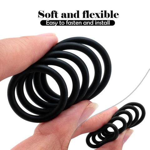 Hand holding black nitrile rubber O-rings from 200 Piece O Rings Assortment Kit Nitrile Rubber Seals Gaskets Set