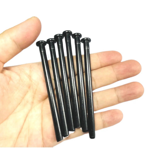Top Shelf 3.5 Inch Interior Door Hinge Pins Slick Black Oil Rubbed Bronze Replacement Screws Six Pack held in hand.