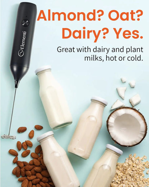 Rechargeable Milk Frother Wand USB-C Handheld Drink Mixer for Home Barista Vibes next to milk bottles and coconut.