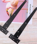 Built Like A Tank Heavy Duty T Shape Triangular Door Hinge With Ball Bearing Core and offset six screw holes on a wooden surface.