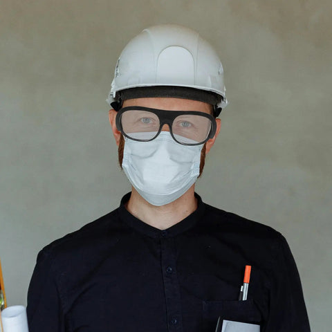Man wearing Six Piece Heavy Duty Welding Safety Glasses Ironclad Brazing Eyewear blocks sparks and fumes with helmet