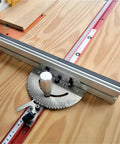 Dead On Precision Miter Gauge With Knockout Heavy Duty Aluminum Fence And Smooth Sliding Flip Stop For Table Saw And Router Assembly 450mm tenon fence on a wooden surface.