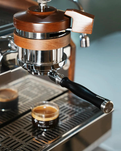 Kickstart Your Brew Routine With Top Shelf 58mm Bottomless Portafilter Featuring Beefy Aluminum Handle And Cranked 18g Double Shot Basket For Breville Espresso BES900XL BES920XL BES980XL BES990BSS For Smooth Shot Vibes Daily, showcasing sleek design and coffee shot.