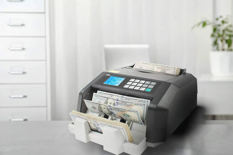 High Speed Money Counting Machine With UV MG And IR Counterfeit Detection Value Counting And 3 Phase Security Scan For Bills Fast Cash Processing For Busy Shops Count Like A Boss in office setting