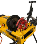 Steel Dragon Tools 300 Compact Pipe Threader Machine With Self Opening Die Head And Two Dies, showcasing red die head and yellow body.