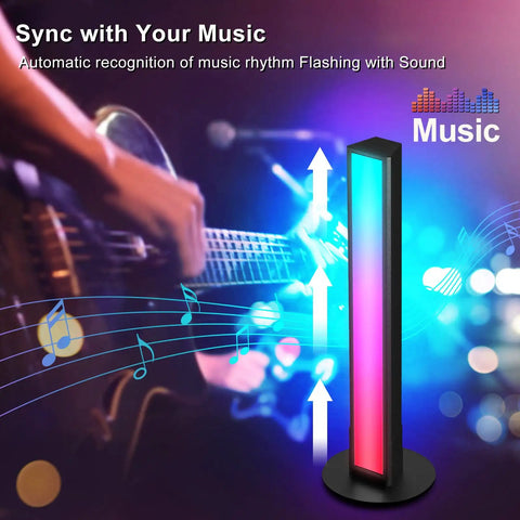 Lit RGB LED Smart Light Bars syncing with music, showing rainbow flow effect next to a guitar, perfect for TV and PC backlighting.