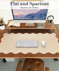 Extra Large PU Leather Desk Pad With Scalloped Edges on wooden desk, keyboard and mouse on top, 40x90 cm, beige tone