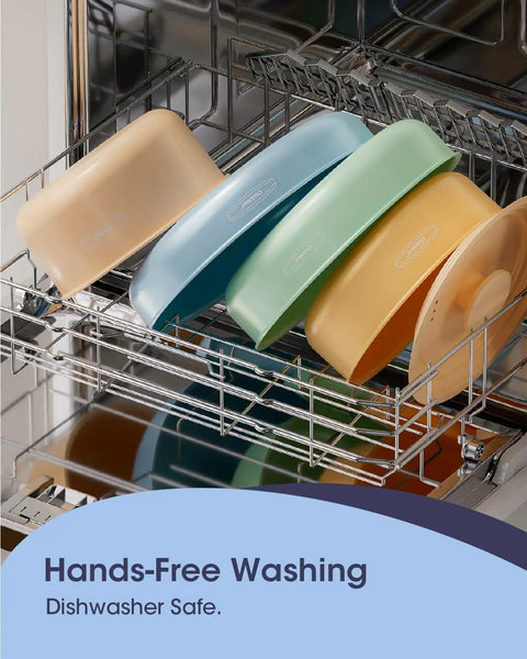 Colorful ceramic cookware set inside dishwasher showcasing easy cleaning and dishwasher safety.