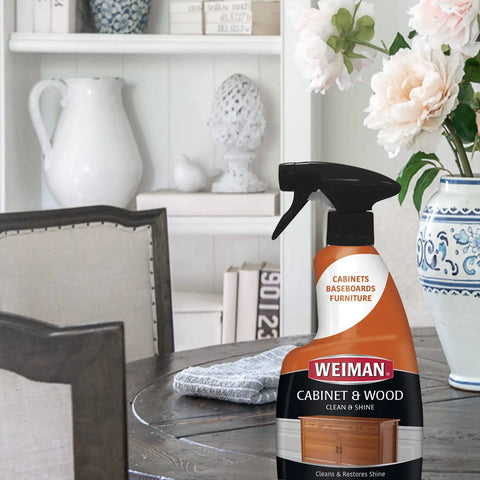 Cabinet And Wood Clean And Shine Spray With Fresh Almond Scent for Kitchen Cabinets, Furniture, Baseboards and Trim on table.