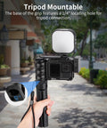 Street Snap Grip Kit For GoPro Hero 13 12 11 10 9 Black With Metal Cage And Ergonomic Handle, anti-slip strap shown in use